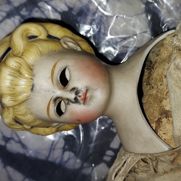 Antique China Head Doll with Blonde Hair & Blue Ribbon in Hair Partial Body